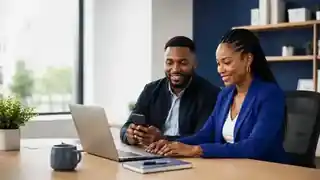 South African professionals setting up their eScripts workspace on a laptop and phone